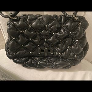 Black Valentino Garavani spike me shoulder bag.